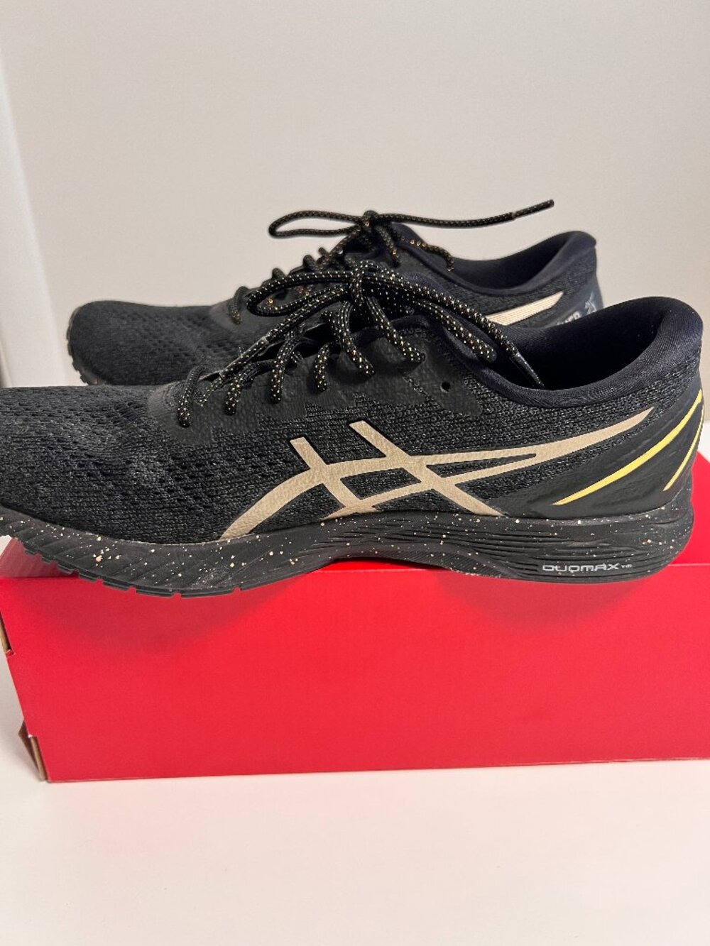 Asics, size 9.5, black and gold tennies